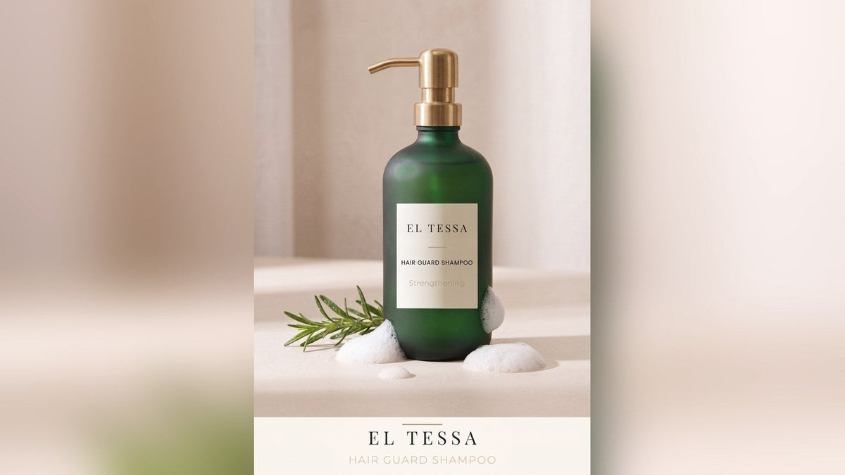 Green EL TESSA Hair Guard Shampoo pump bottle with a rosemary sprig and foam