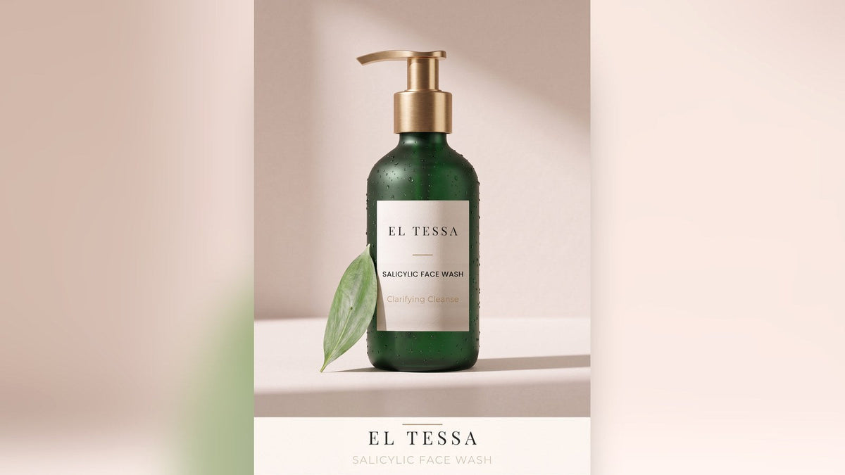 Green EL TESSA Salicylic Face Wash pump bottle with a green leaf on a beige table