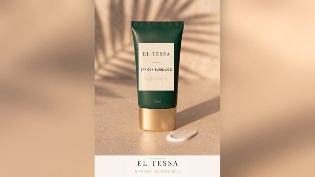 Green EL TESSA SPF 60+ Sunblock tube with a palm-leaf shadow and a swatch of sunscreen