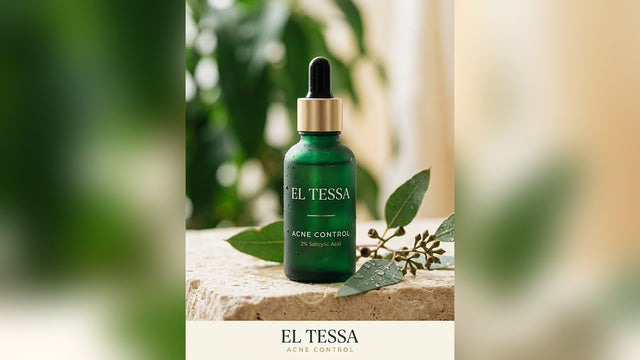 Green EL TESSA Acne Control serum bottle with 2% salicylic acid on a stone block, with leaves