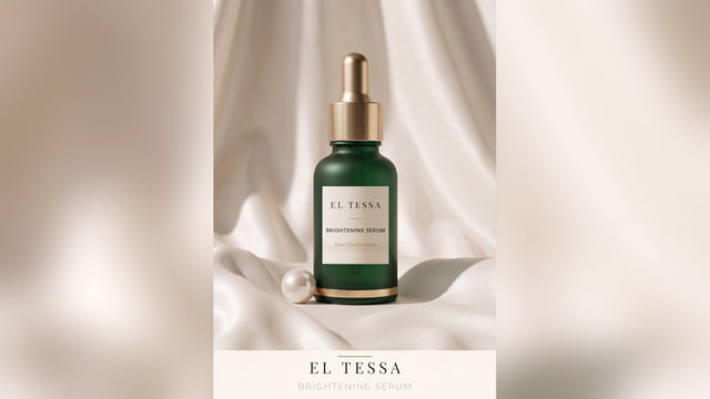 Green EL TESSA Brightening Serum dropper bottle on soft white fabric with a pearl
