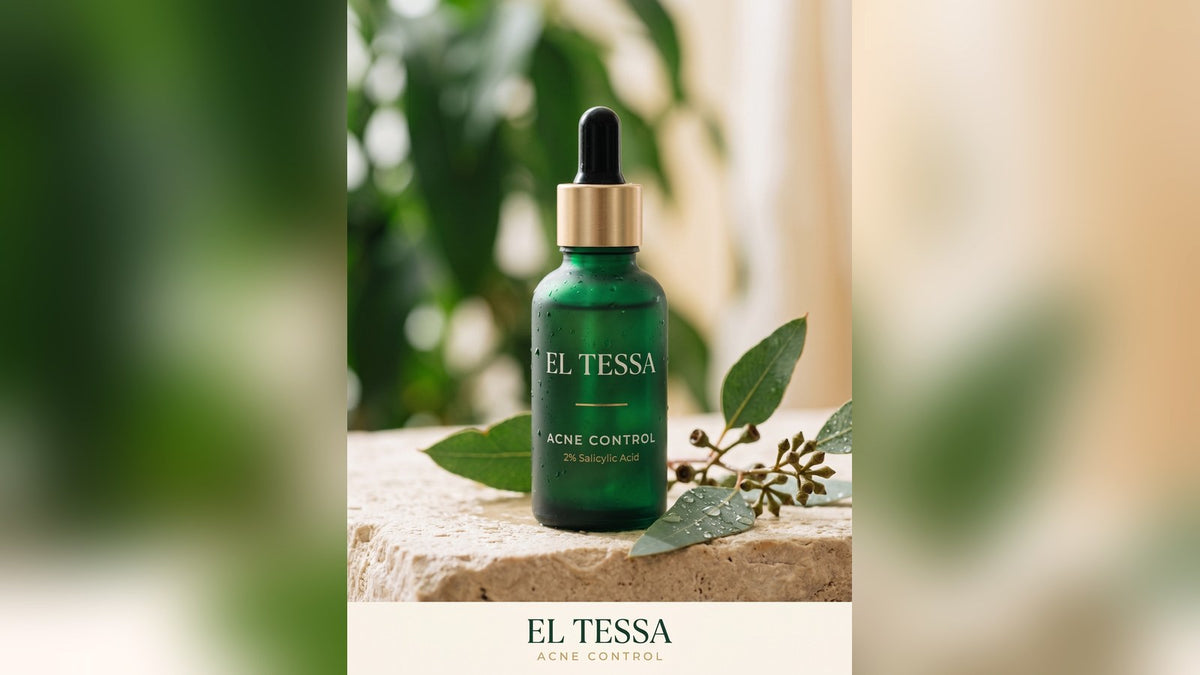 Green EL TESSA Acne Control serum bottle with 2% salicylic acid on a stone block, with leaves