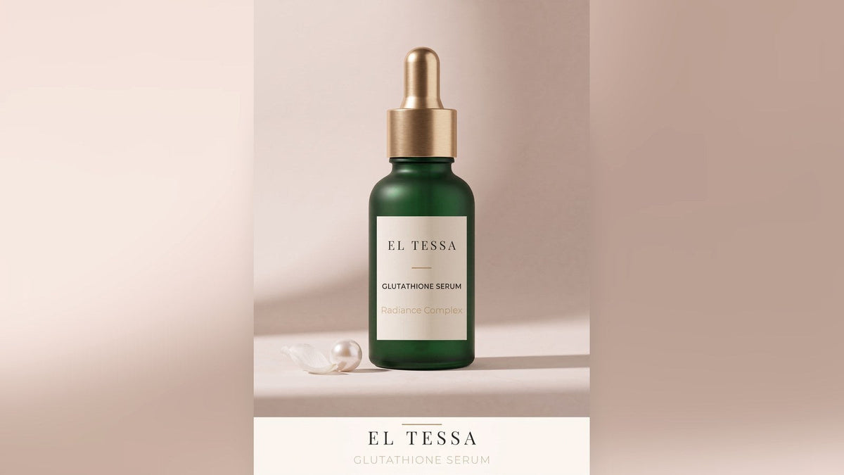 Green EL TESSA Glutathione Serum dropper bottle with a pearl on a beige surface